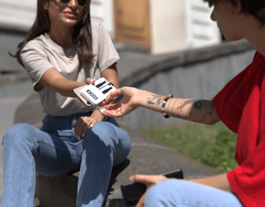 Girl giving a guy a Brick