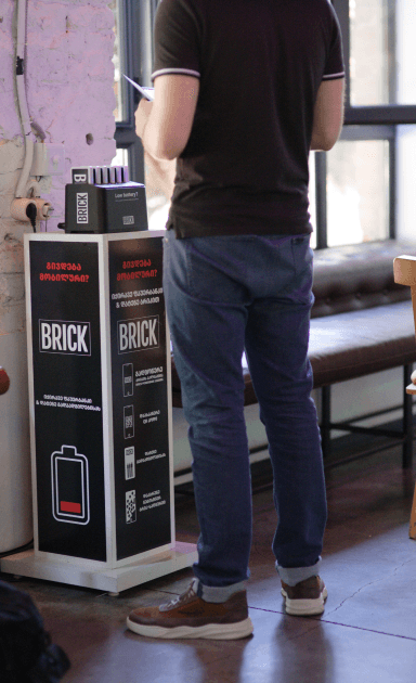 Guy standing at a Brick station in Georgia